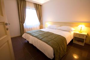 Postel nebo postele na pokoji v ubytování Guest House Šterk