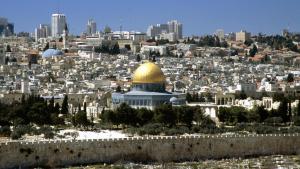a view of the city of jerusalem with the dome of the rock at Palm Hostel in Jerusalem