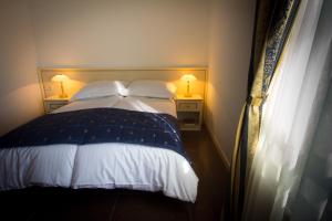 Postel nebo postele na pokoji v ubytování Guest House Šterk