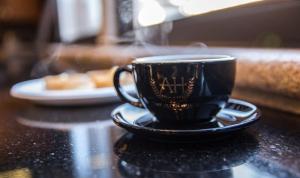 Příslušenství pro přípravu čaje a kávy v ubytování The Allen Hotel