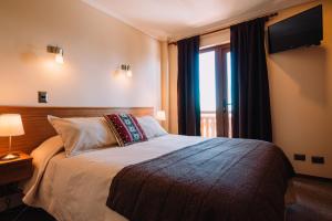 Posteľ alebo postele v izbe v ubytovaní Hotel Chalet Valluga