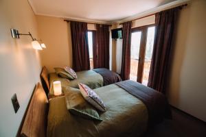 Posteľ alebo postele v izbe v ubytovaní Hotel Chalet Valluga