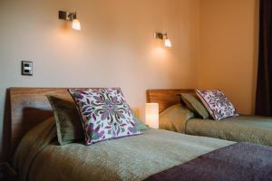 Posteľ alebo postele v izbe v ubytovaní Hotel Chalet Valluga