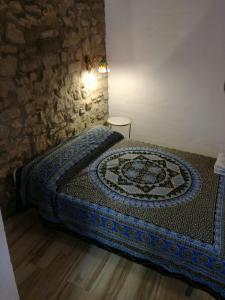 Łóżko lub łóżka w pokoju w obiekcie LA MIRILLA SUITES 3