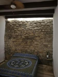 Łóżko lub łóżka w pokoju w obiekcie LA MIRILLA SUITES 3