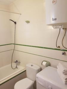 Łazienka w obiekcie Apartamentos Olympia Garden