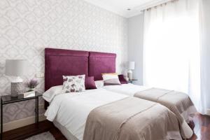 Premium Home Recoletos - 5BR 3BTにあるベッド