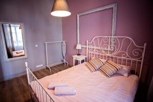 Posteľ alebo postele v izbe v ubytovaní Apartamenty Nowy Rynek