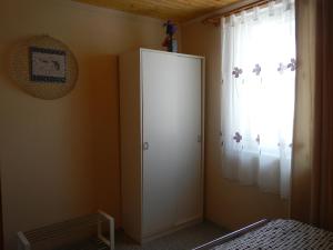Posteľ alebo postele v izbe v ubytovaní Vakáció Apartman