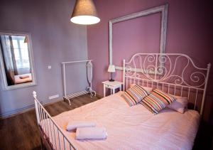 Posteľ alebo postele v izbe v ubytovaní Apartamenty Nowy Rynek