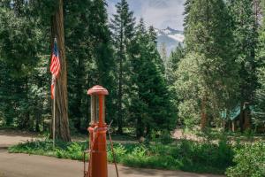 an american flag on a pole in a park at Silver City Mountain Resort in Sequoia National Park