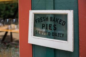 a sign on a door that reads fresh baked pies serveddain at Silver City Mountain Resort in Sequoia National Park