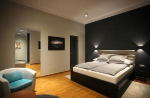 Säng eller sängar i ett rum på Gateway Budapest City Center