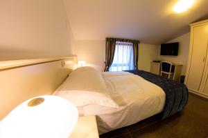 Postel nebo postele na pokoji v ubytování Guest House Šterk