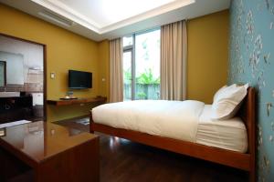 TV a/nebo společenská místnost v ubytování Pretty Sun B&B
