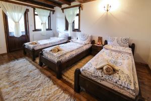 Кровать или кровати в номере Yancheva Guest House