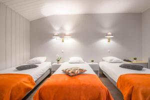 Cama o camas de una habitación en Mandarina Hotel Luxembourg Strassen