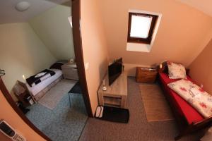Posteľ alebo postele v izbe v ubytovaní Apartmány Morávka