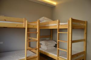 Postel nebo postele na pokoji v ubytování Lemongo Youth Hostel Hohhot + 37 fotografií