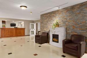 The lobby or reception area at Travelodge by Wyndham Owen Sound ON