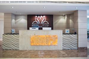 a lobby of a hotel with a reception desk at Motiara Hotel - Al Murouj in Riyadh