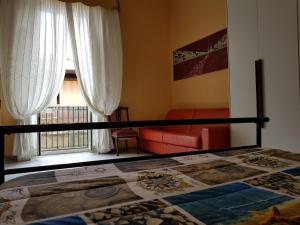 Posteľ alebo postele v izbe v ubytovaní Casa Parthenope