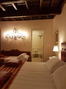 Una cama o camas en una habitación de Domus Julia