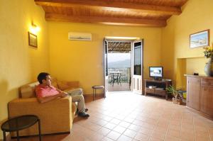TV a/nebo společenská místnost v ubytování Residence Casa Torretta