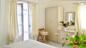 Postel nebo postele na pokoji v ubytování Hotel Villa Augustus