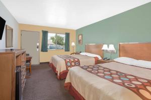 Voodi või voodid majutusasutuse Super 8 by Wyndham St. George UT toas