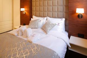 Postel nebo postele na pokoji v ubytování Hotel Passpartù Home Garni