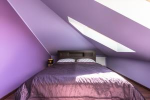 Posteľ alebo postele v izbe v ubytovaní Apartament Osiedle Bałtyk