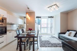 Kuchyňa alebo kuchynka v ubytovaní Apartament Osiedle Bałtyk
