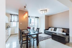 Kuchyňa alebo kuchynka v ubytovaní Apartament Osiedle Bałtyk