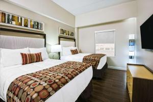 Postel nebo postele na pokoji v ubytování Hawthorn Extended Stay by Wyndham McAllen