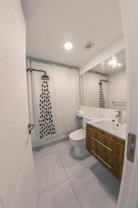 Kylpyhuone majoituspaikassa Apart Hotel Viscachani