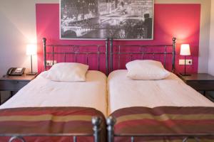 Postel nebo postele na pokoji v ubytování Auberge de la Lesse