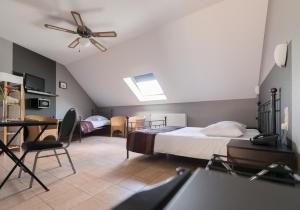 Postel nebo postele na pokoji v ubytování Auberge de la Lesse
