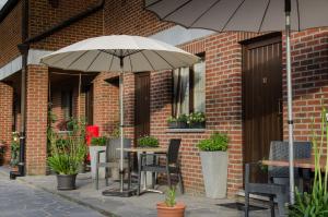 Patio nebo venkovní prostory v ubytování Auberge de la Lesse