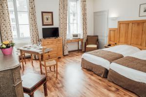 Postel nebo postele na pokoji v ubytování Appart Hotel Charles Sander