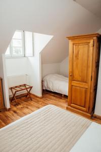 Postel nebo postele na pokoji v ubytování Appart Hotel Charles Sander