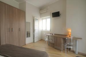 Postel nebo postele na pokoji v ubytování Albergo Anita Alassio