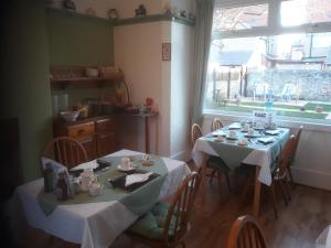 Reštaurácia alebo iné gastronomické zariadenie v ubytovaní Glenavon Guest House