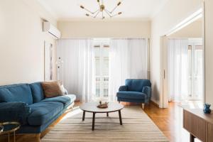 A seating area at Chic Flat in the Heart of Athens by UPSTREET