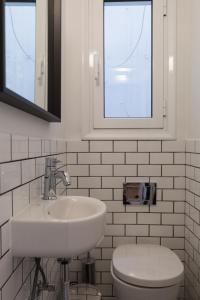 A bathroom at Chic Flat in the Heart of Athens by UPSTREET
