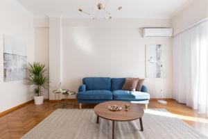 A seating area at Chic Flat in the Heart of Athens by UPSTREET