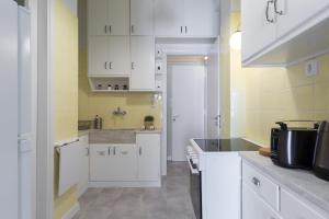 A kitchen or kitchenette at Chic Flat in the Heart of Athens by UPSTREET