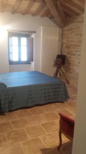 Postel nebo postele na pokoji v ubytování Valbuona B&B