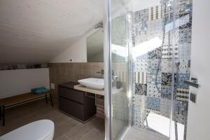 Koupelna v ubytování B&B - Uva Residence