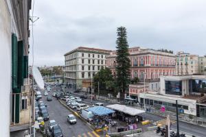 a view of a city street with cars and buildings at Savoy Riviera in Naples